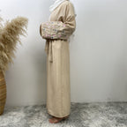 عباية مطرزة من القطن والقنب بزهر الخوخ