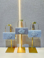 حقيبة يد صغيرة مربعة على شكل زهرة 