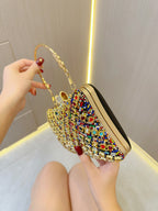 حقيبة يد مزينة بأحجار الراين والخرز اللامع 