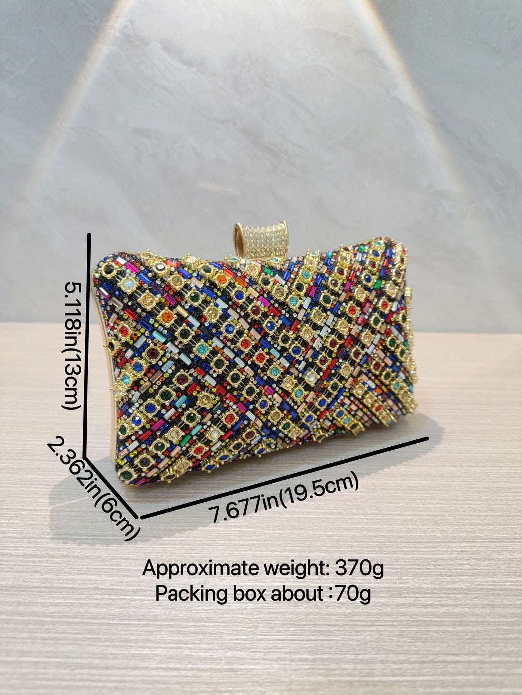 حقيبة يد مزينة بأحجار الراين والخرز اللامع 