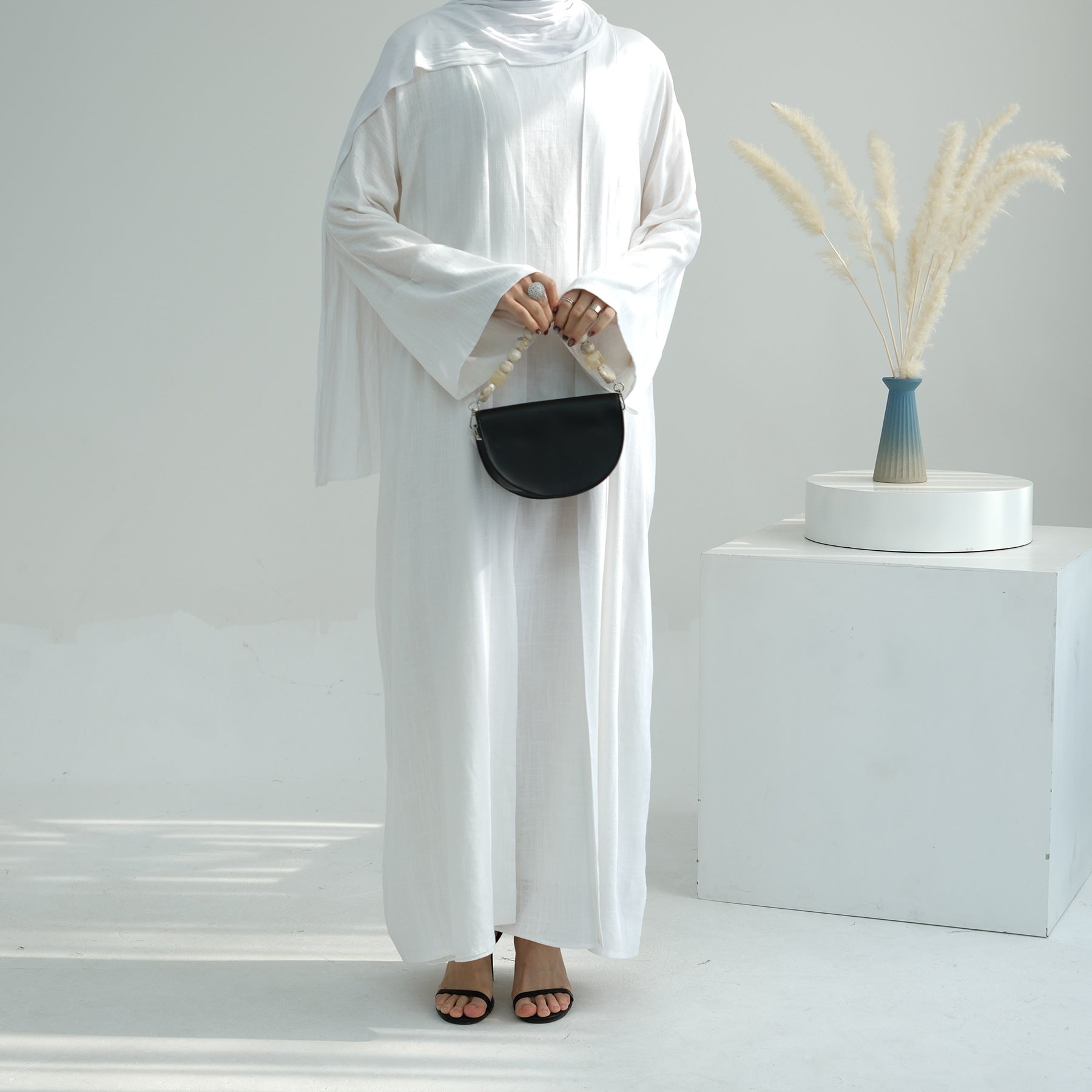 فستان بدون أكمام مع كارديجان متناسق مع جيوب