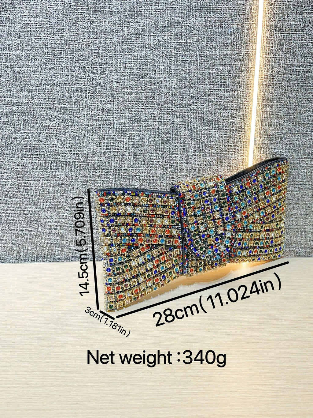 حقيبة يد أنيقة مزينة بعقدة من حجر الراين 