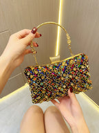 حقيبة يد مزينة بأحجار الراين والخرز اللامع 